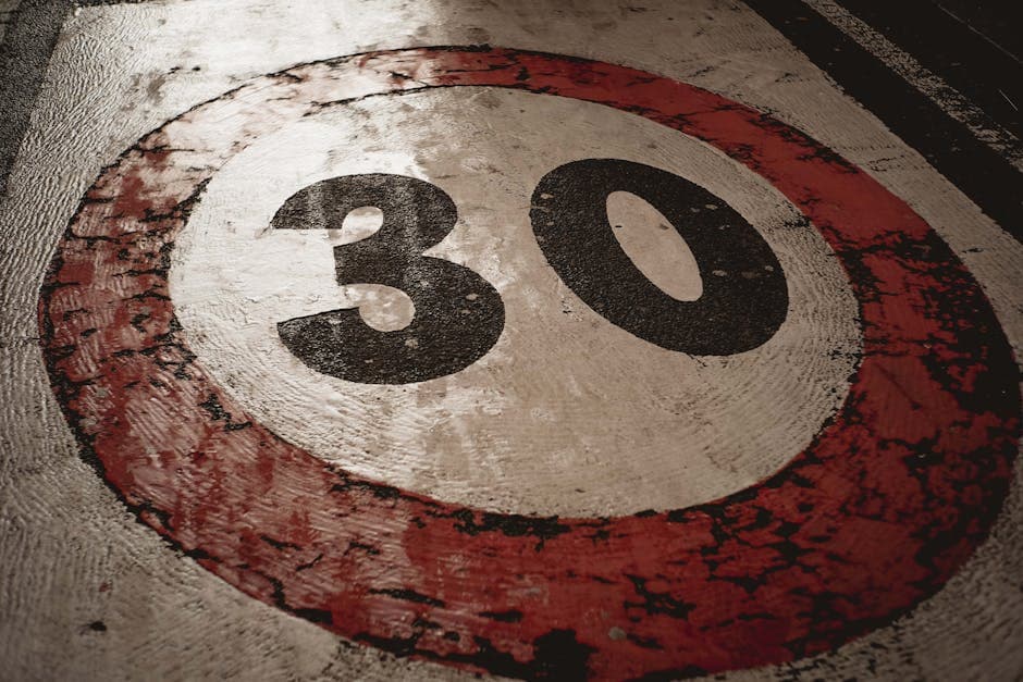 Rood-witte label met het nummer 30
