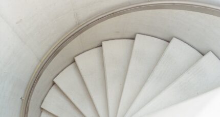 High Angle Photo of White Spiral Staircase