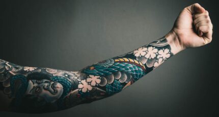 Foto van linkerarm met tatoeage